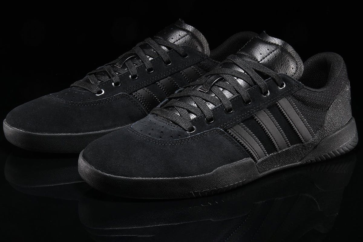 solid black adidas shoes